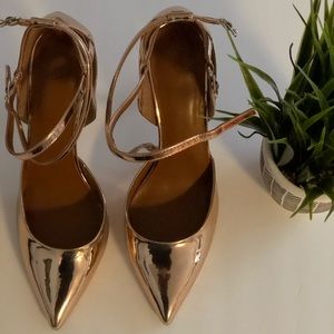 Rose gold pumps